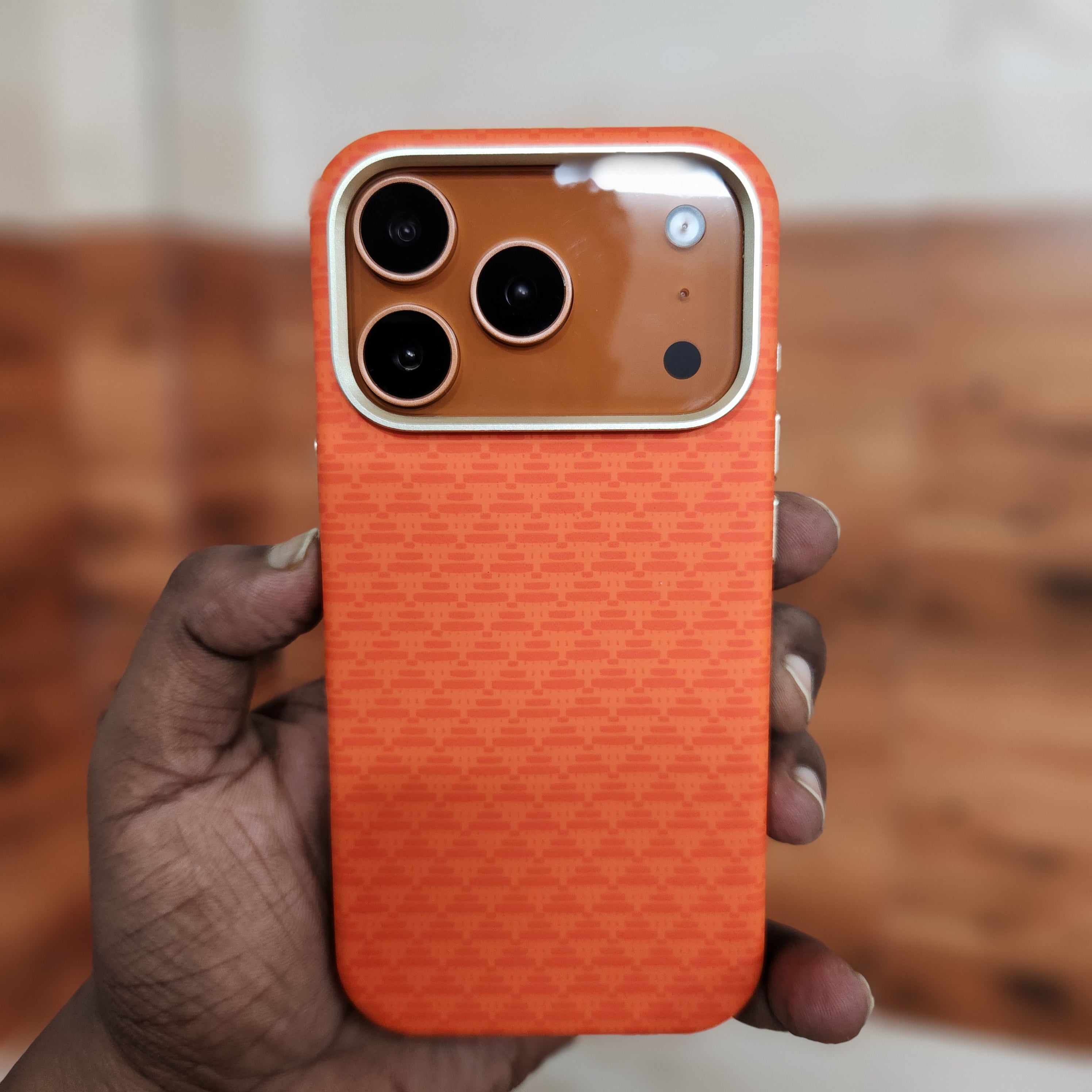 iPhone 17 Pro Sibling Series Sleek Cross Texture Case with Metal Camera Protection - Orange